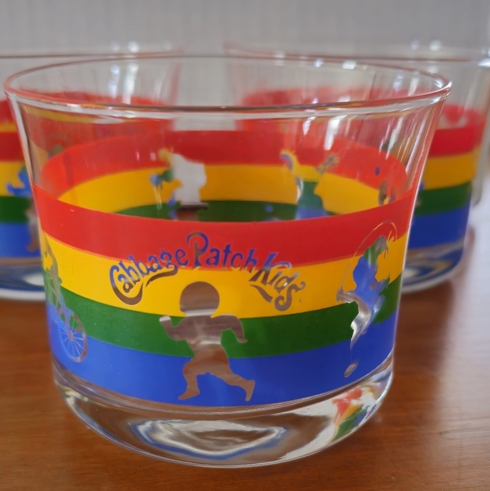3 Vintage 1984 Rainbow Cabbage Patch Kids drinking glasses depicting skating
